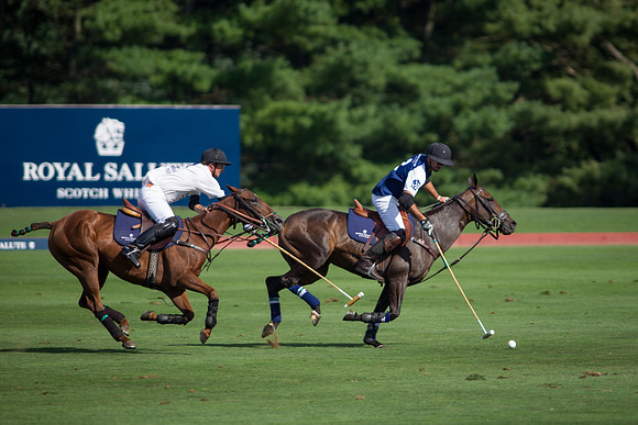 Royal-Salutes-Facundo-Pieres-on-the-ball-chased-by-Airstreams-Nick-Manifold-at-the-Royal-Salute-Jubilee-Cup-2013